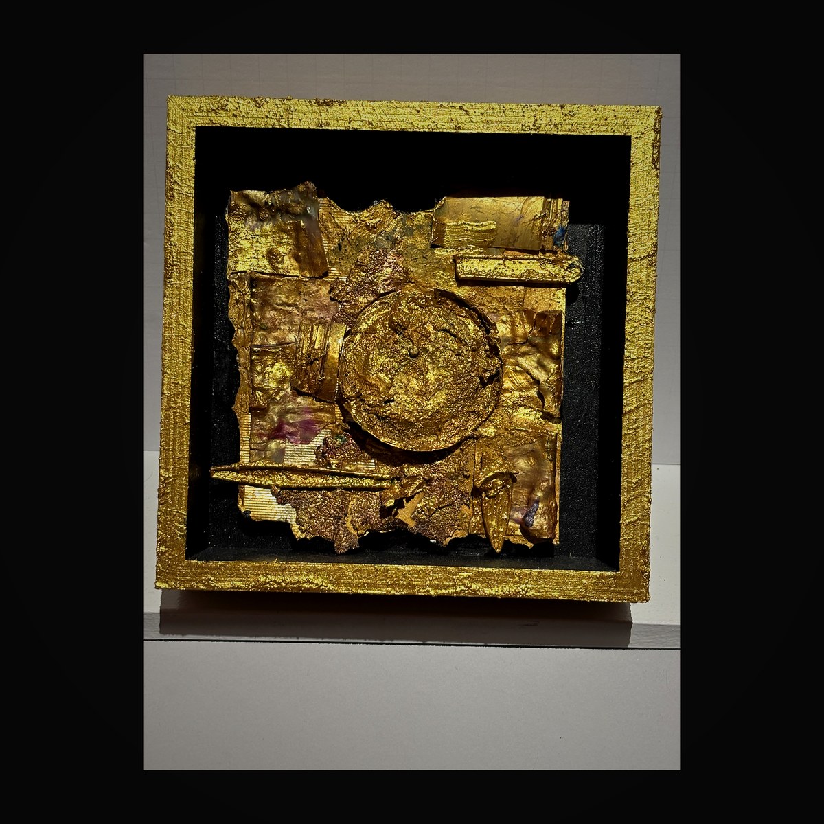 Rich amber and copper enamel radiating from a central golden disc